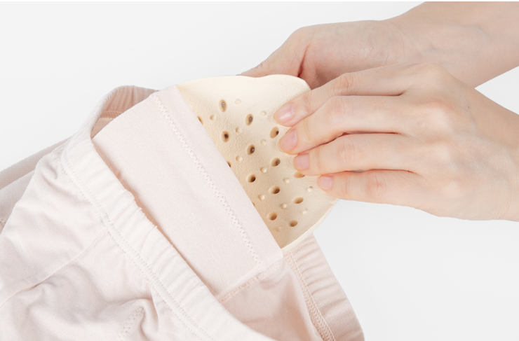Inserting QuanFoam pad into shorts pocket